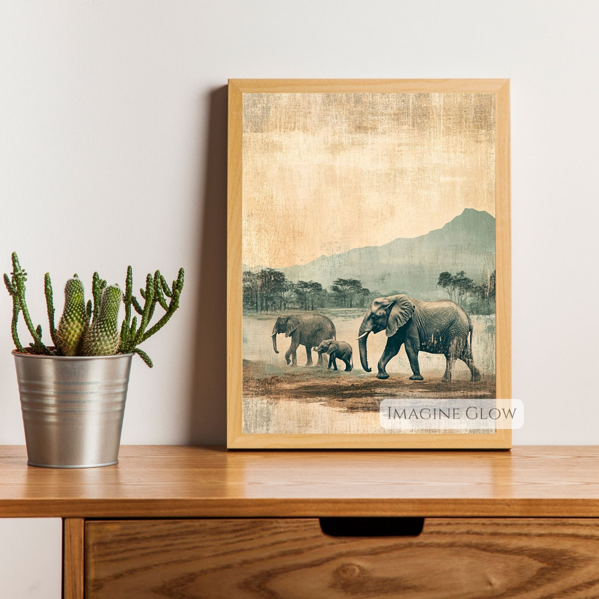 Safari-themed decor art with an elephant family.