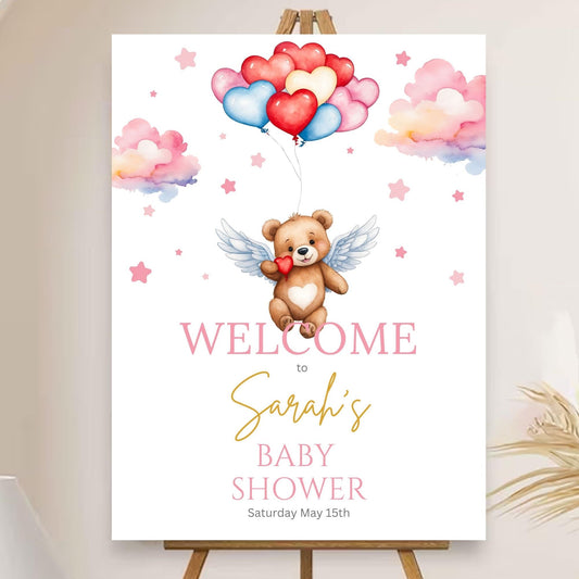 Custom baby girl party sign featuring bear and balloons.