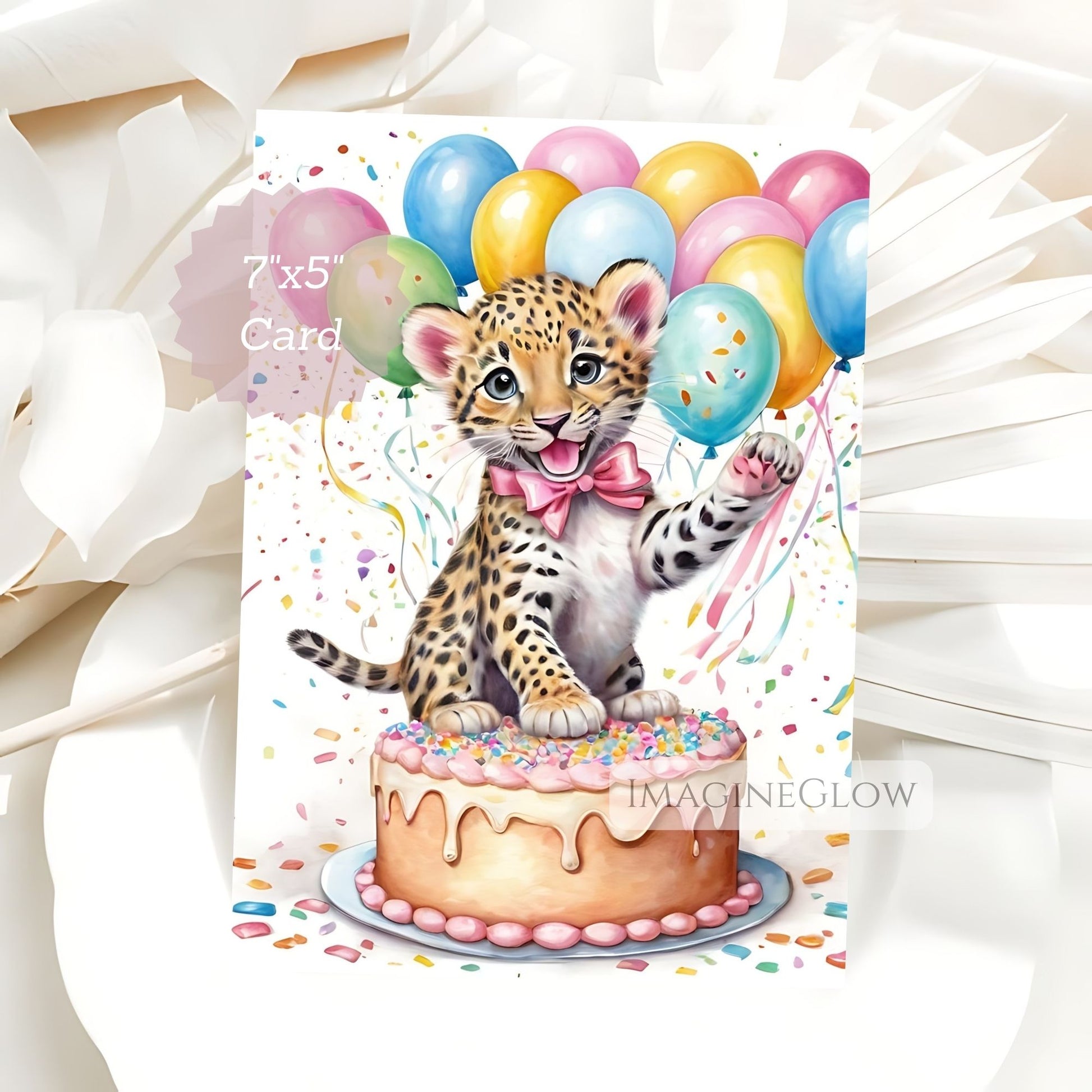 Card with a leopard cub on a cake and balloons