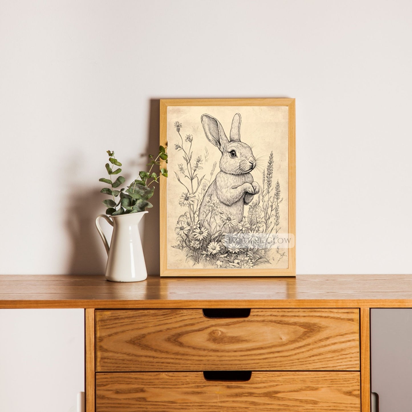 Antique-inspired bunny illustration with floral accents.