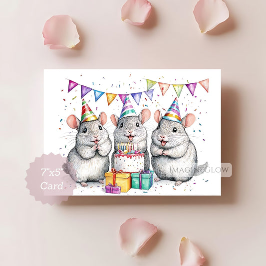 Birthday card with three rats wearing party hats around a cake and presents on a light pink background.