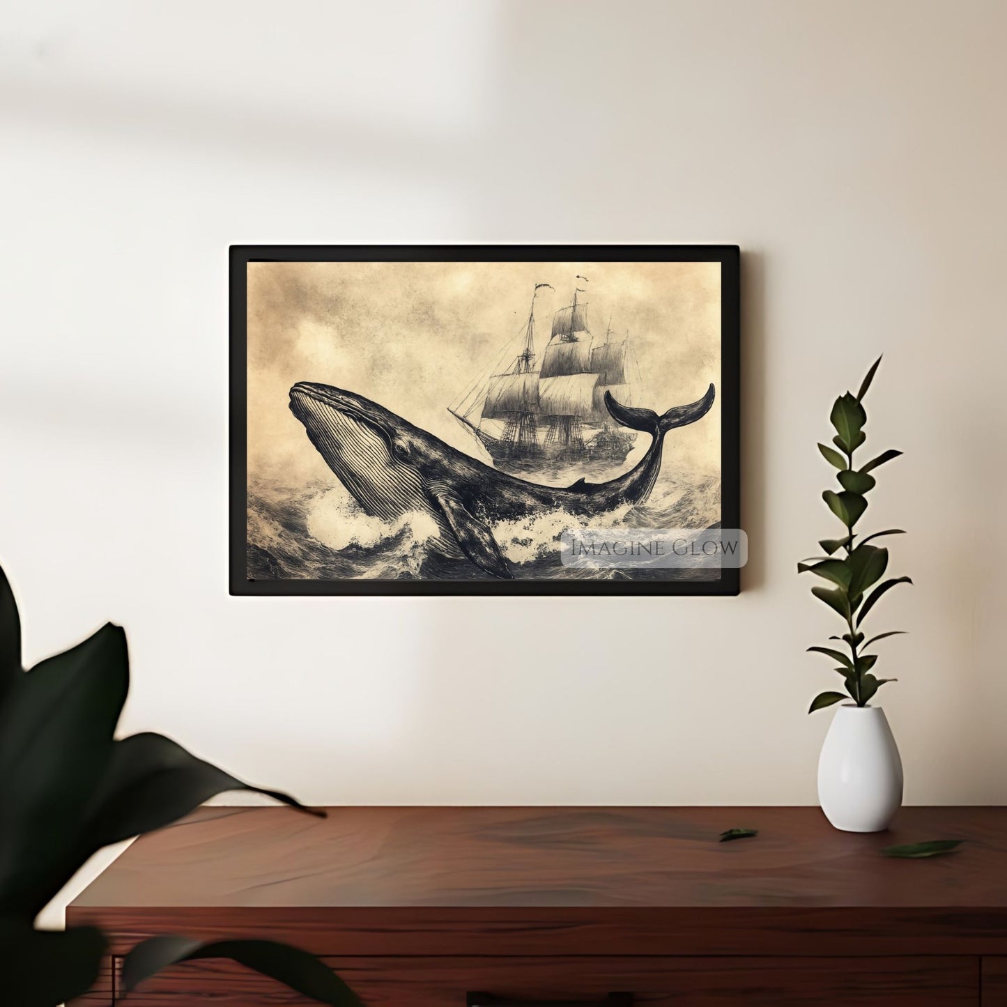 Ocean-inspired wall art with whale and old ship.
Timeless maritime print of whale and sailing vessel.