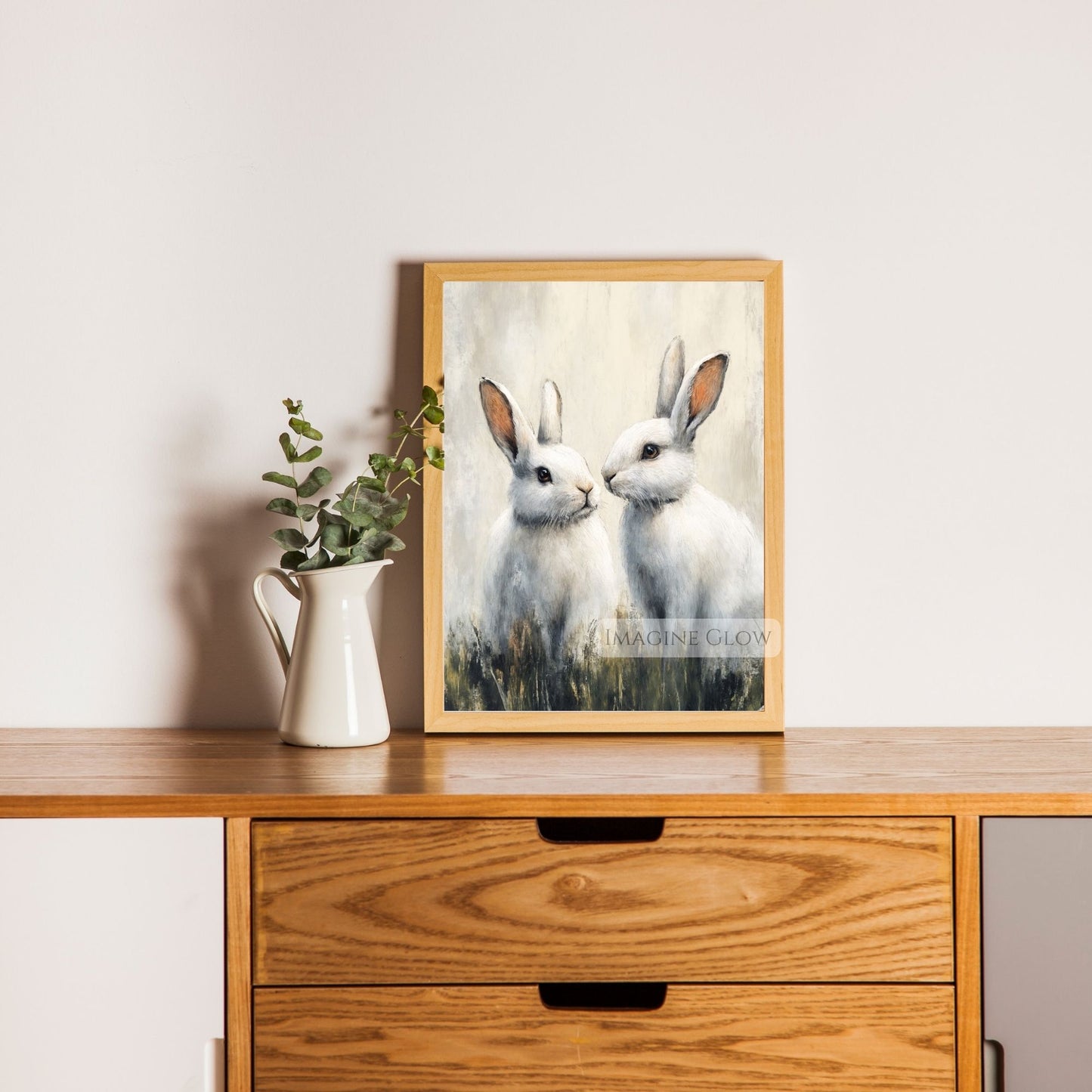 Classic white bunny duo vintage art print
Two white rabbits resting in a meadow painting