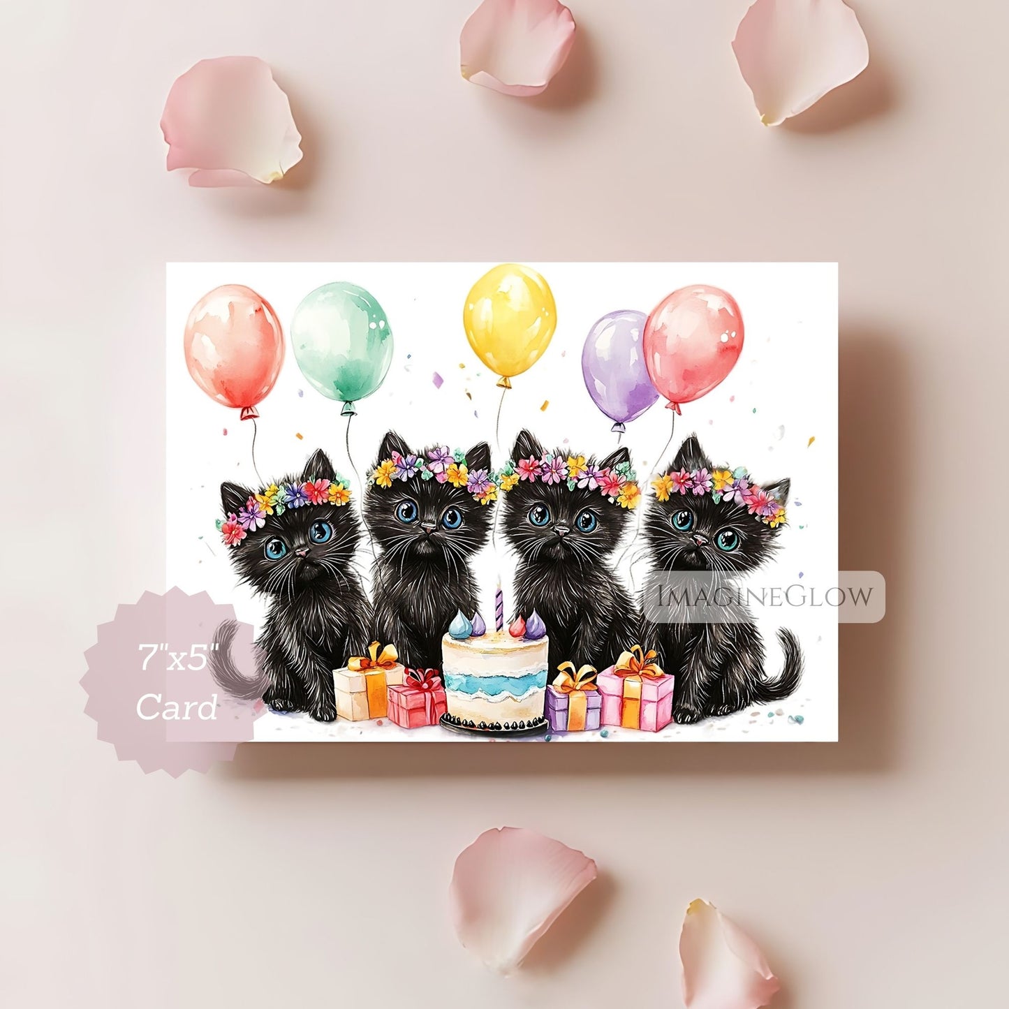 Card with four black kittens celebrating a birthday, surrounded by balloons and a cake, on a light pink background.