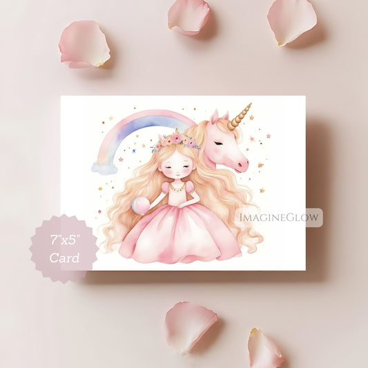 Card with illustration of a girl and unicorn surrounded by rose petals on a light pink background.