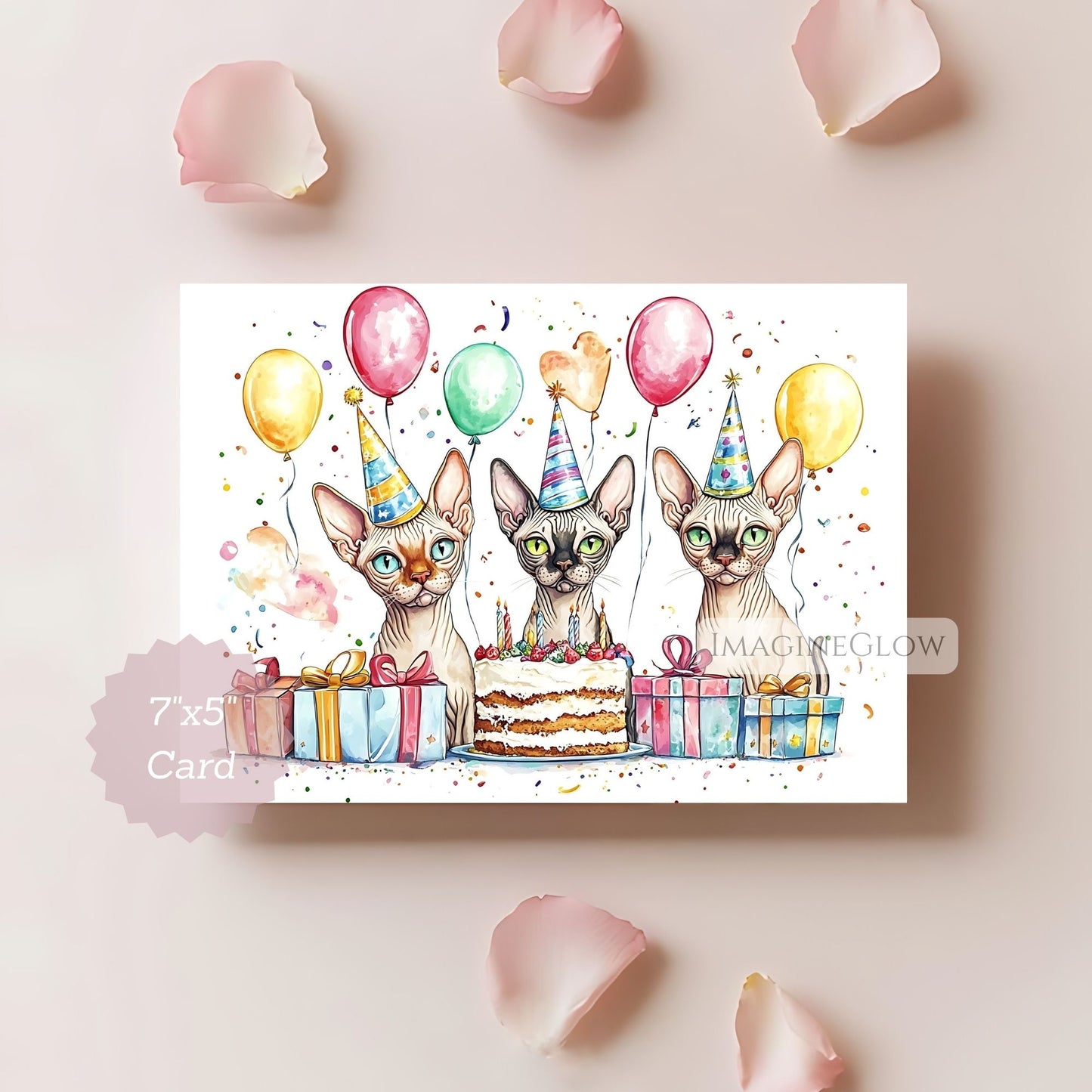 Birthday card with three cartoon cats wearing party hats, surrounded by balloons and a cake on a light pink background.