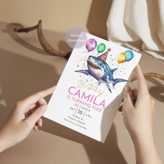Shark birthday party invitation with colorful balloons