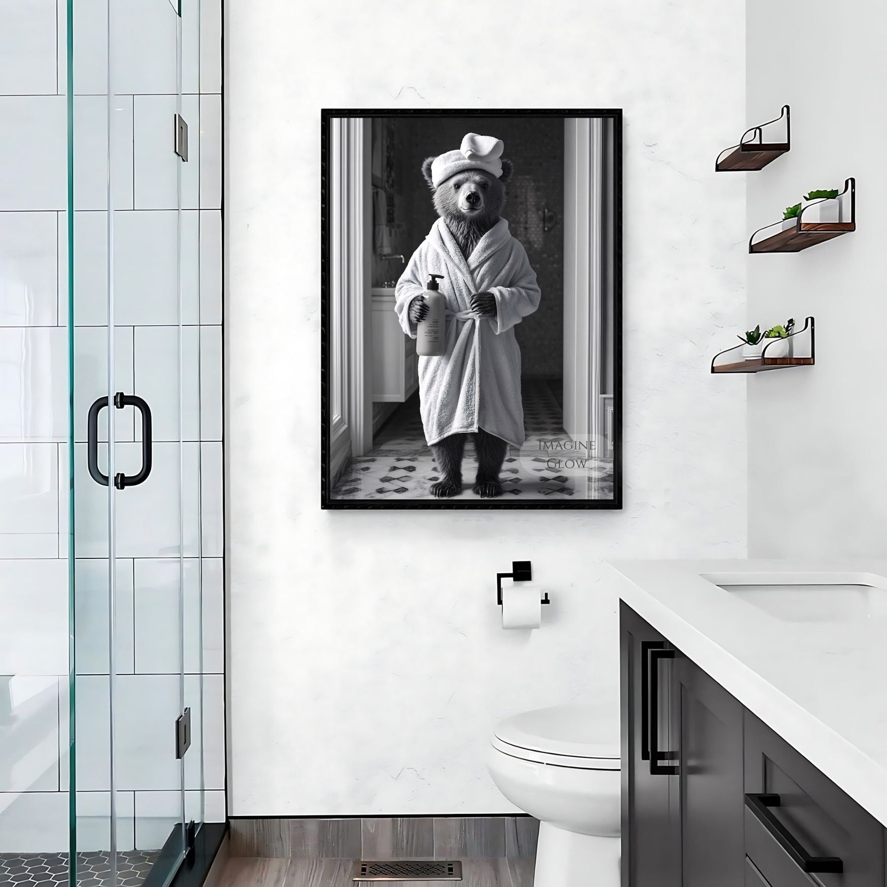 Restroom wall decor featuring a bear in black and white