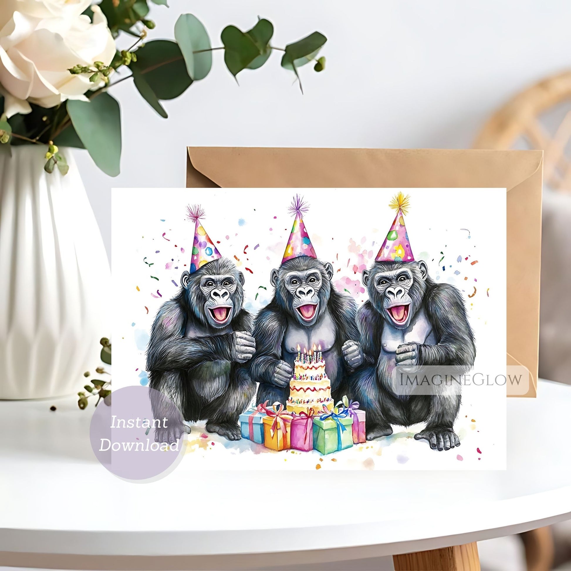 Birthday card with three monkeys wearing party hats around a cake and presents