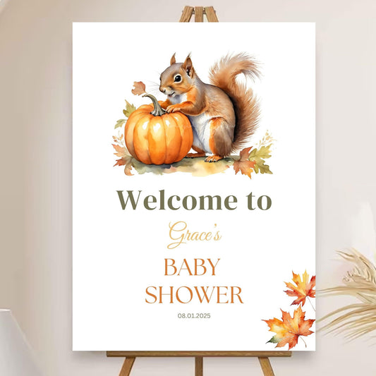Fall theme Little Pumpkin baby shower decor with squirrel and pumpkin.