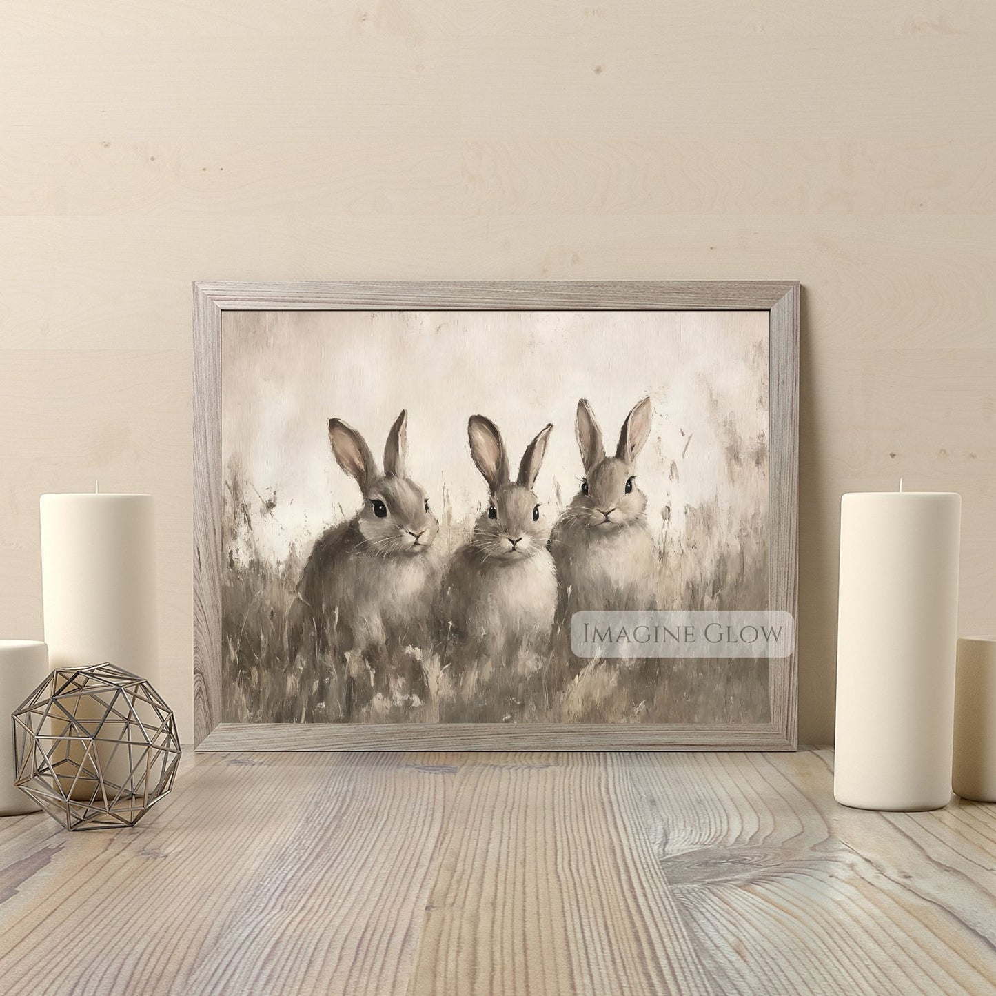 Rustic farmhouse artwork featuring three rabbits in the grass
