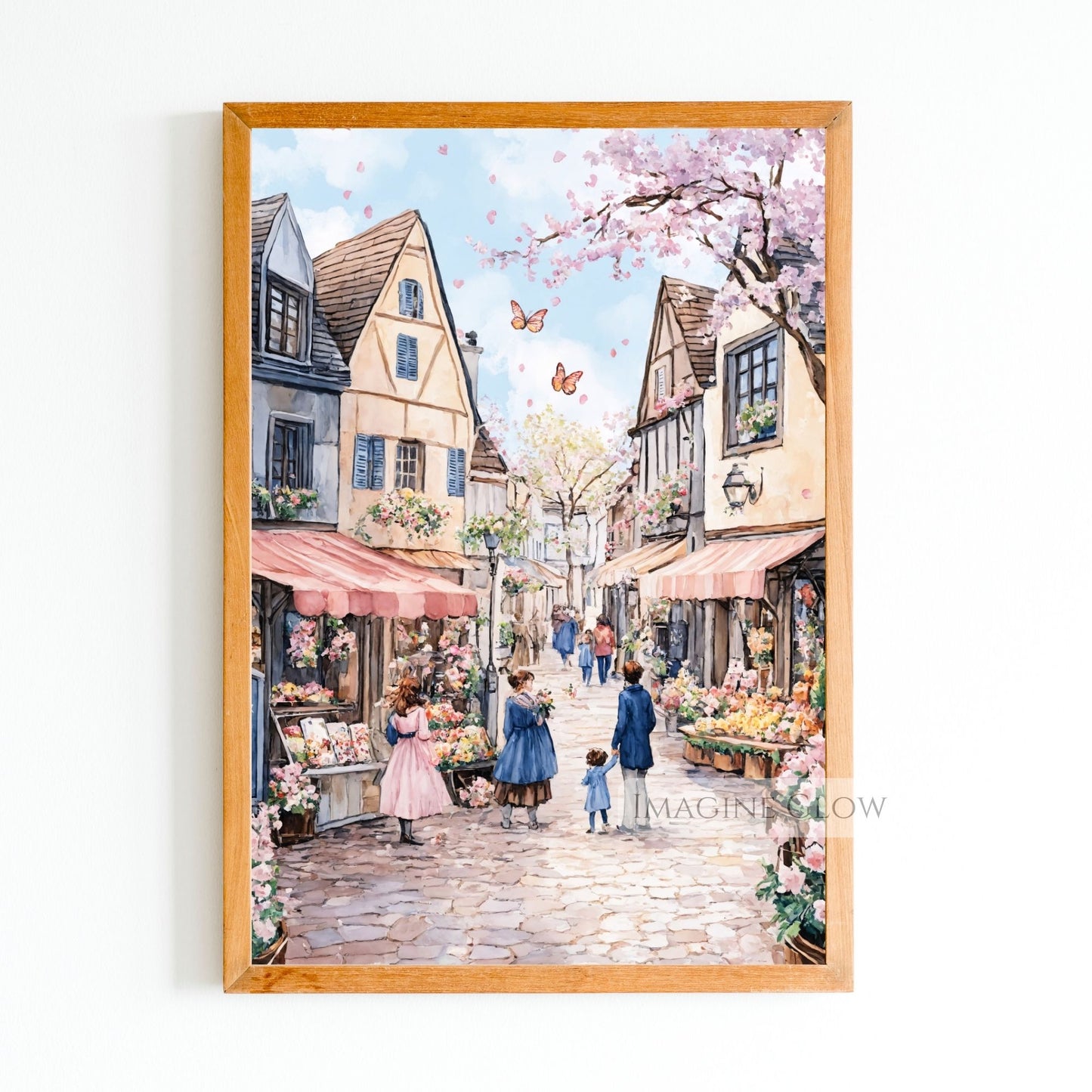Charming cobblestone street in spring with tulips, cherry blossoms, and market stalls.