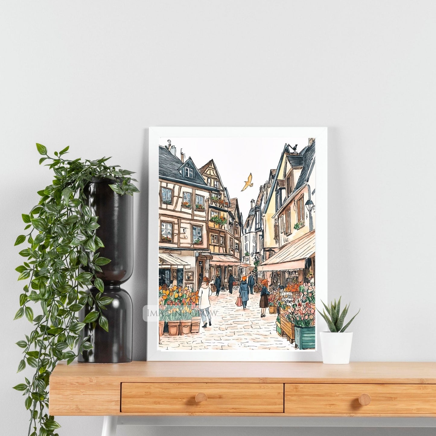 Blooming spring cityscape with vibrant flowers and European-style buildings.