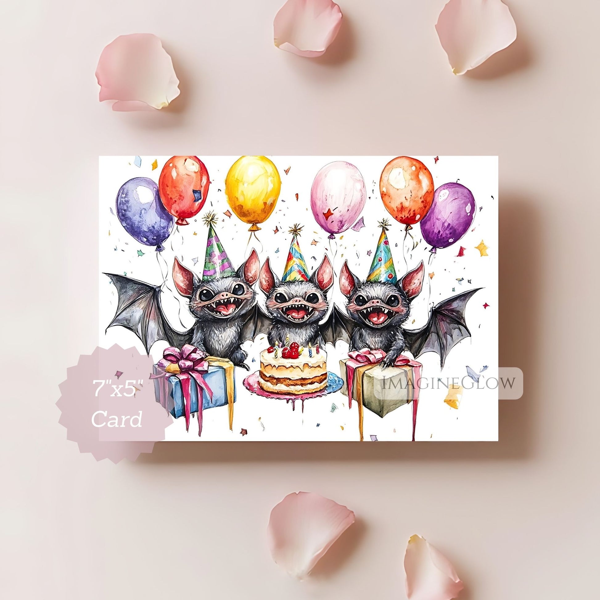 Card with cartoon bats celebrating a birthday, surrounded by balloons and gifts on a light pink background.