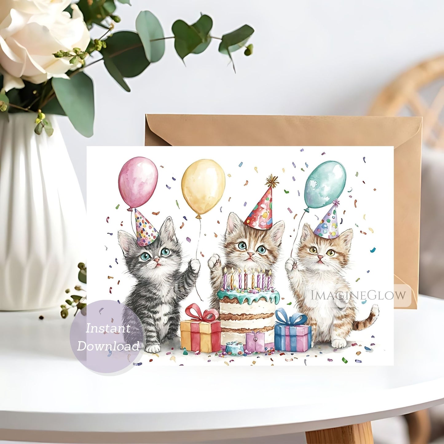 Greeting card with kittens celebrating a birthday, featuring balloons and a cake.