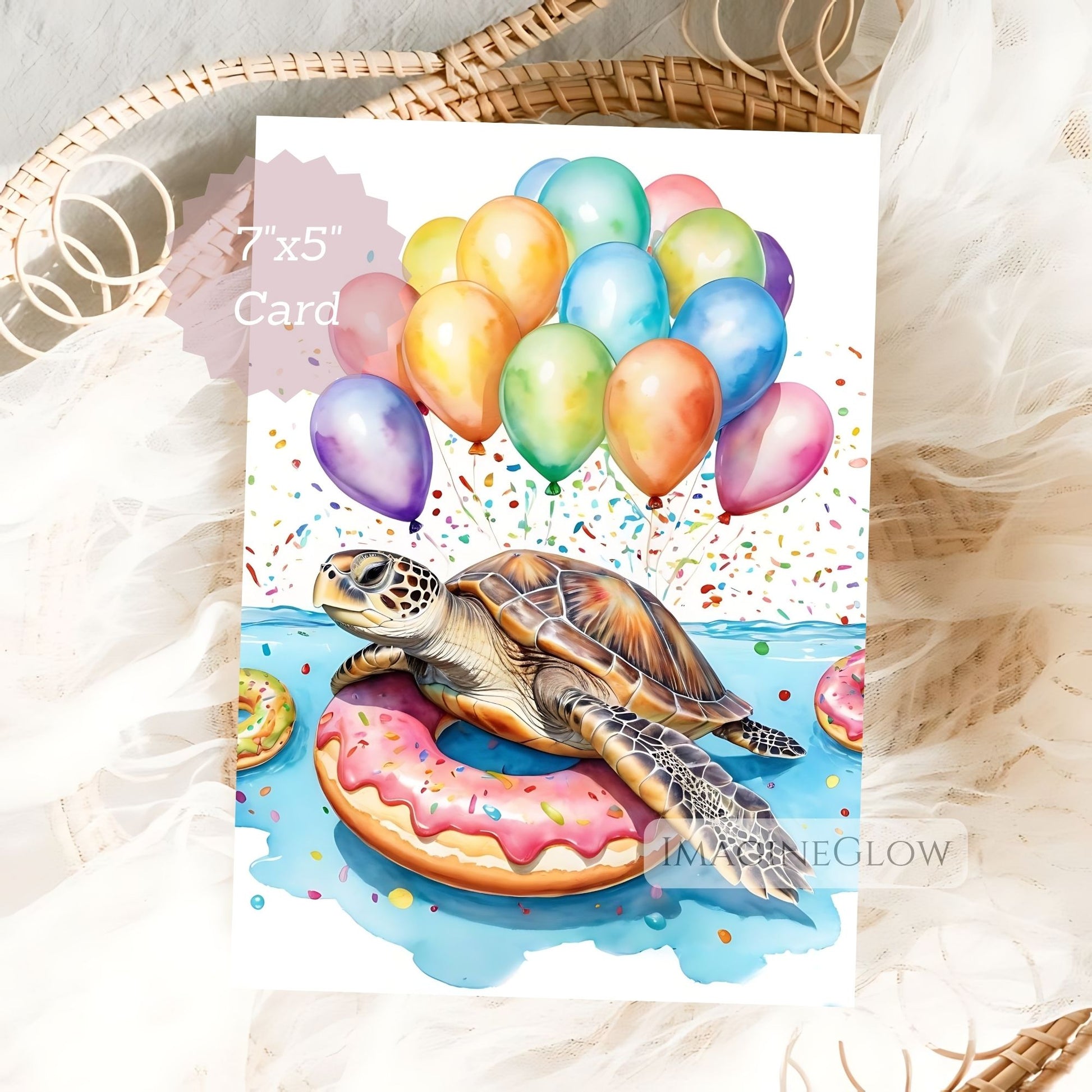 Card with a turtle holding a donut and balloons on a white background