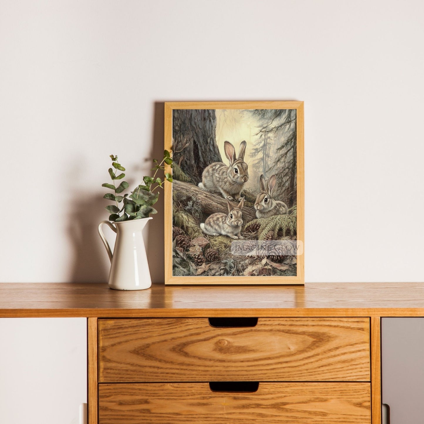 Rabbit family in a tranquil woodland setting.