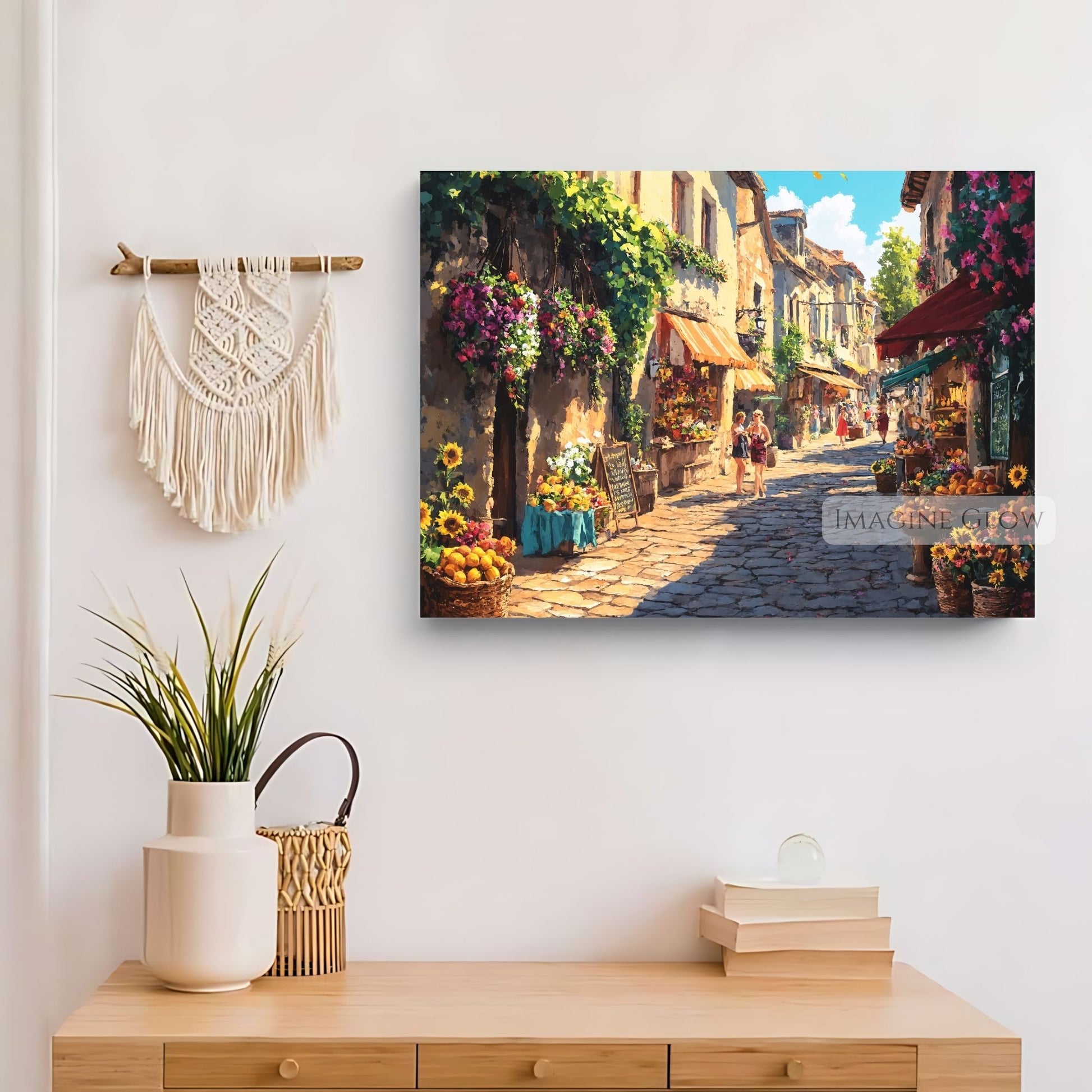 Sunlit cobblestone street with bright flowers and cozy cafés.