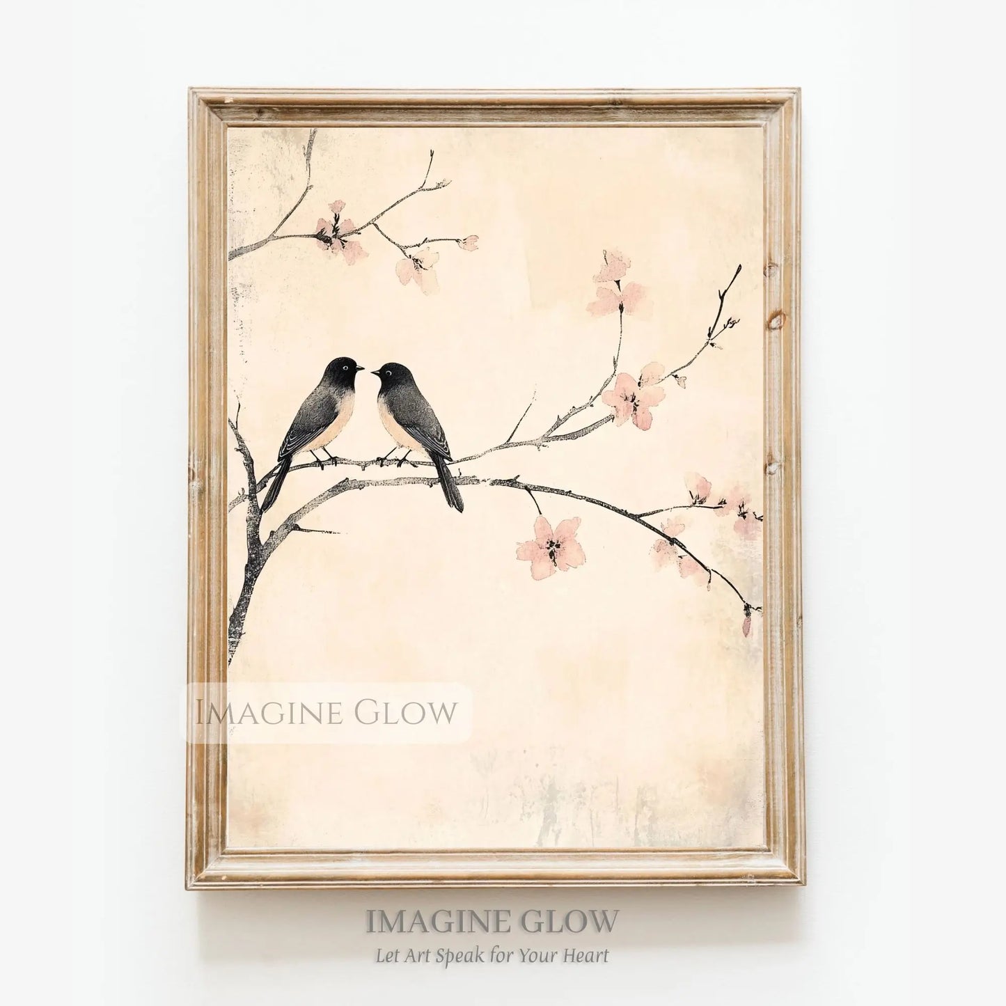 Antique bird illustration of two birds perched on a blooming branch
