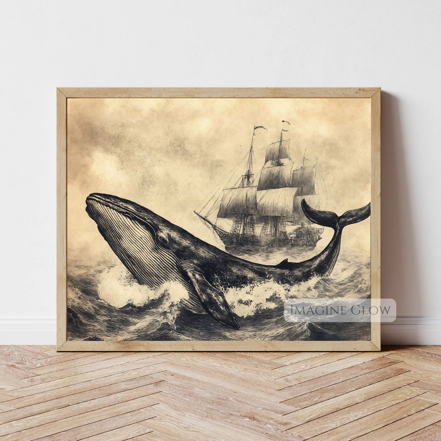 Nautical whale and sailing ship wall art.