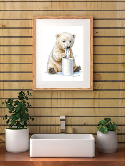 Humorous bathroom wall art featuring a polar bear on a toilet