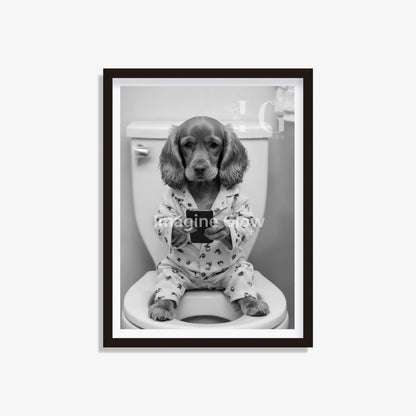 Quirky bathroom wall art featuring a Cocker Spaniel in a toilet