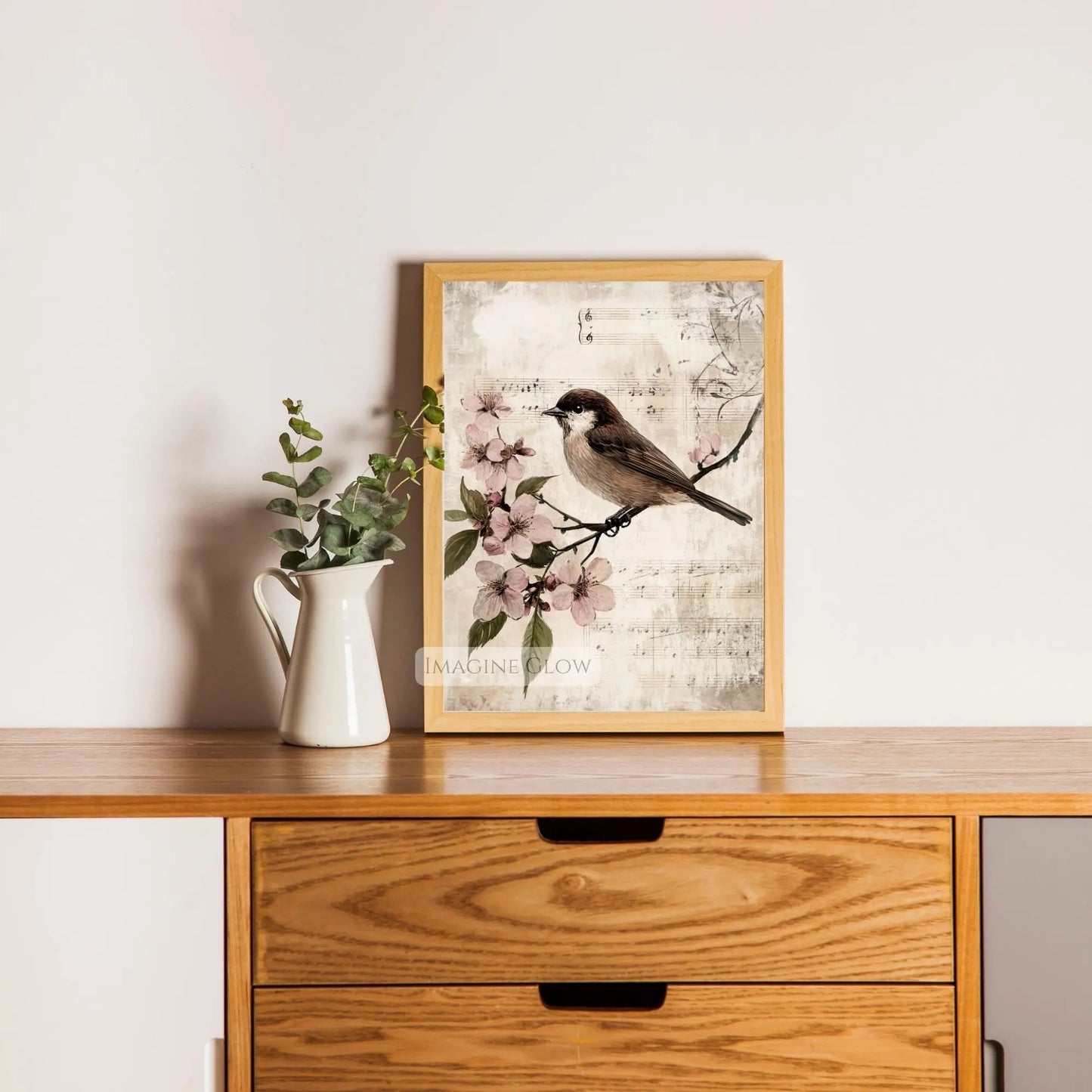 Antique bird art featuring a bird on a flowering branch
