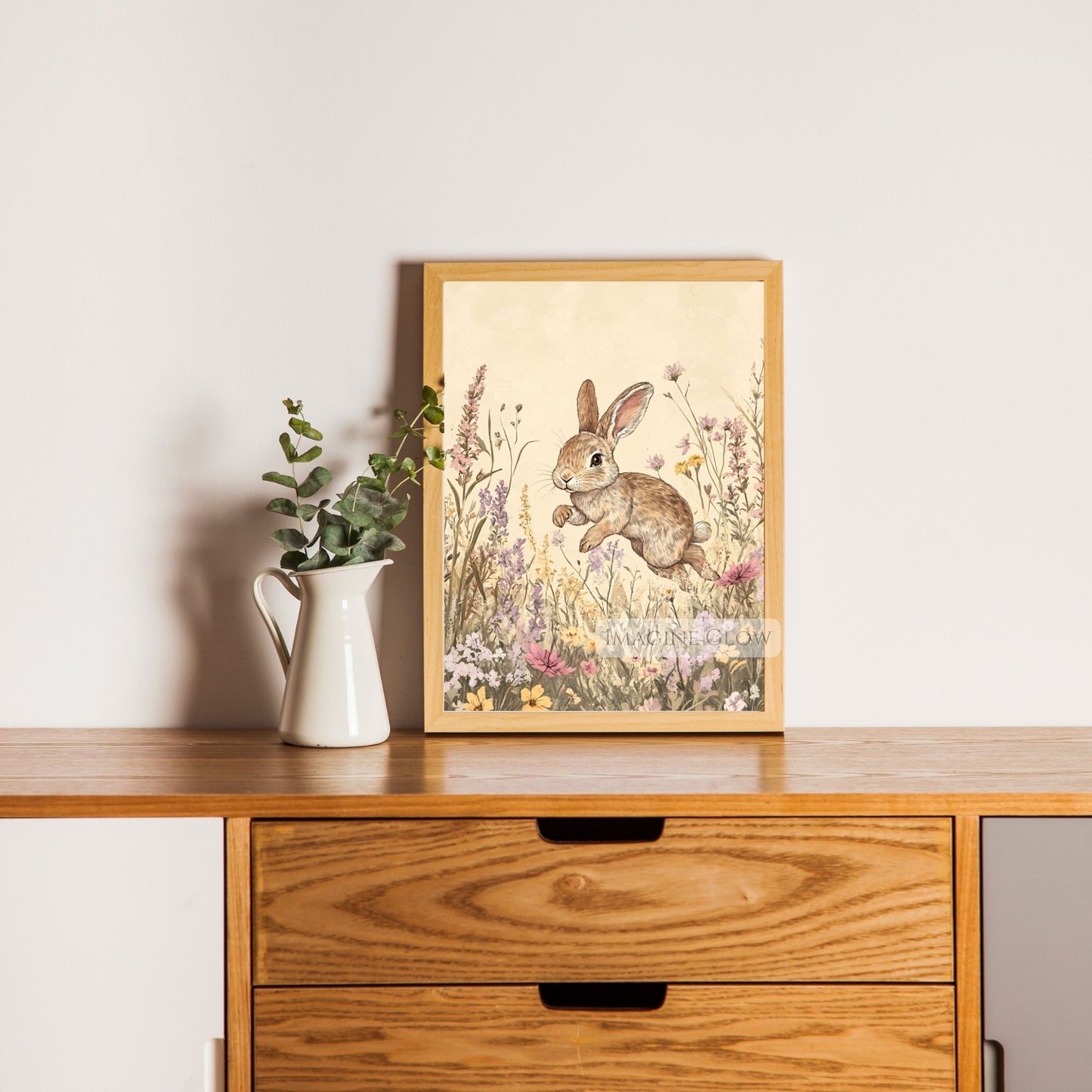 Vintage bunny painting with wildflowers in rustic tones.
