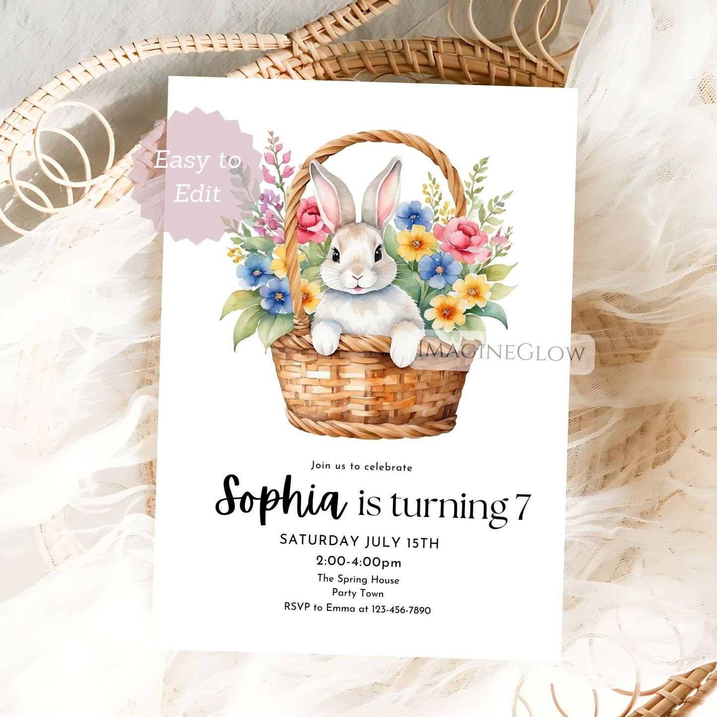 Invitation card with a bunny and flowers on a white background