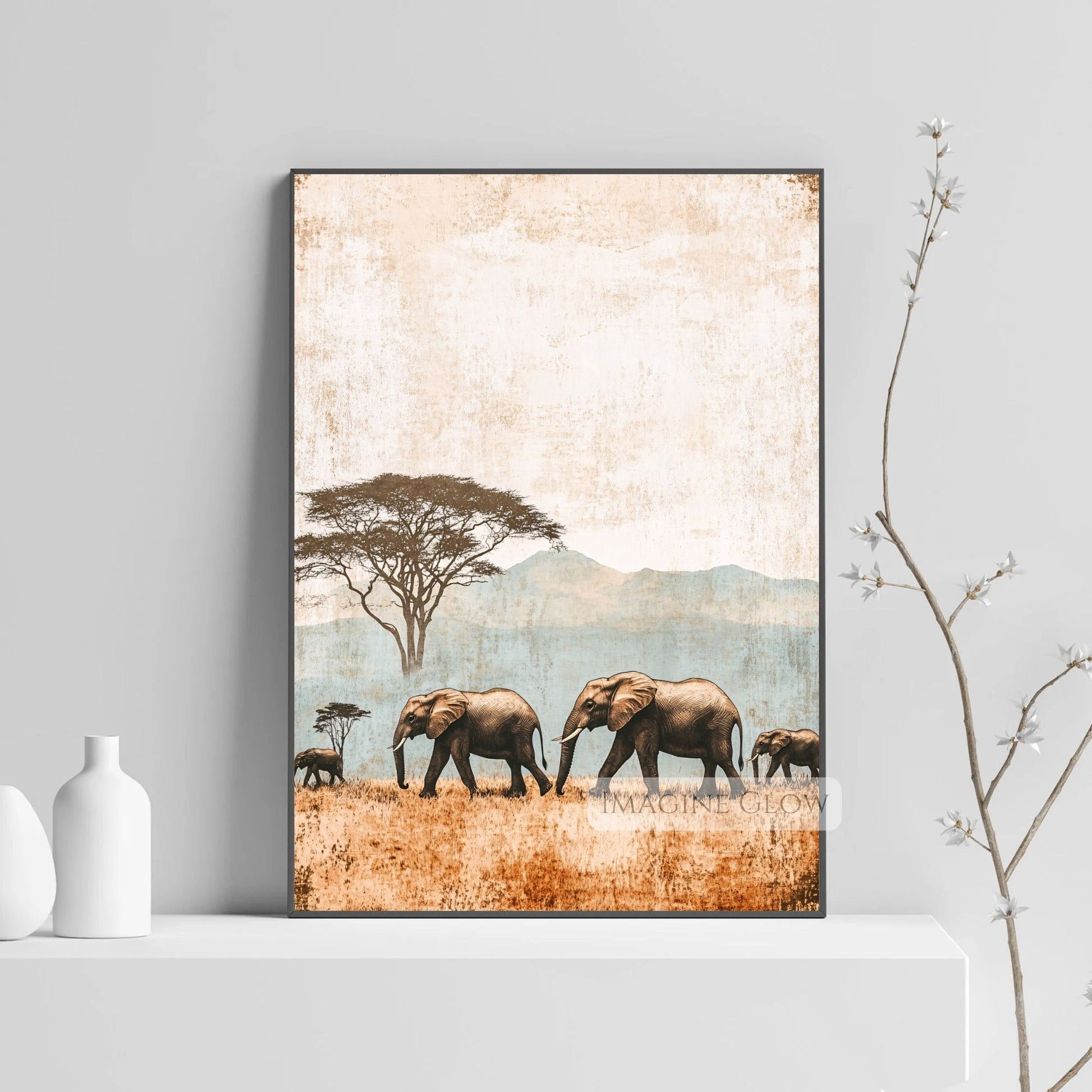Antique safari art featuring elephants on the savanna.
