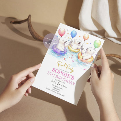 Polar bears in sunglasses on a cute pool party birthday card.
