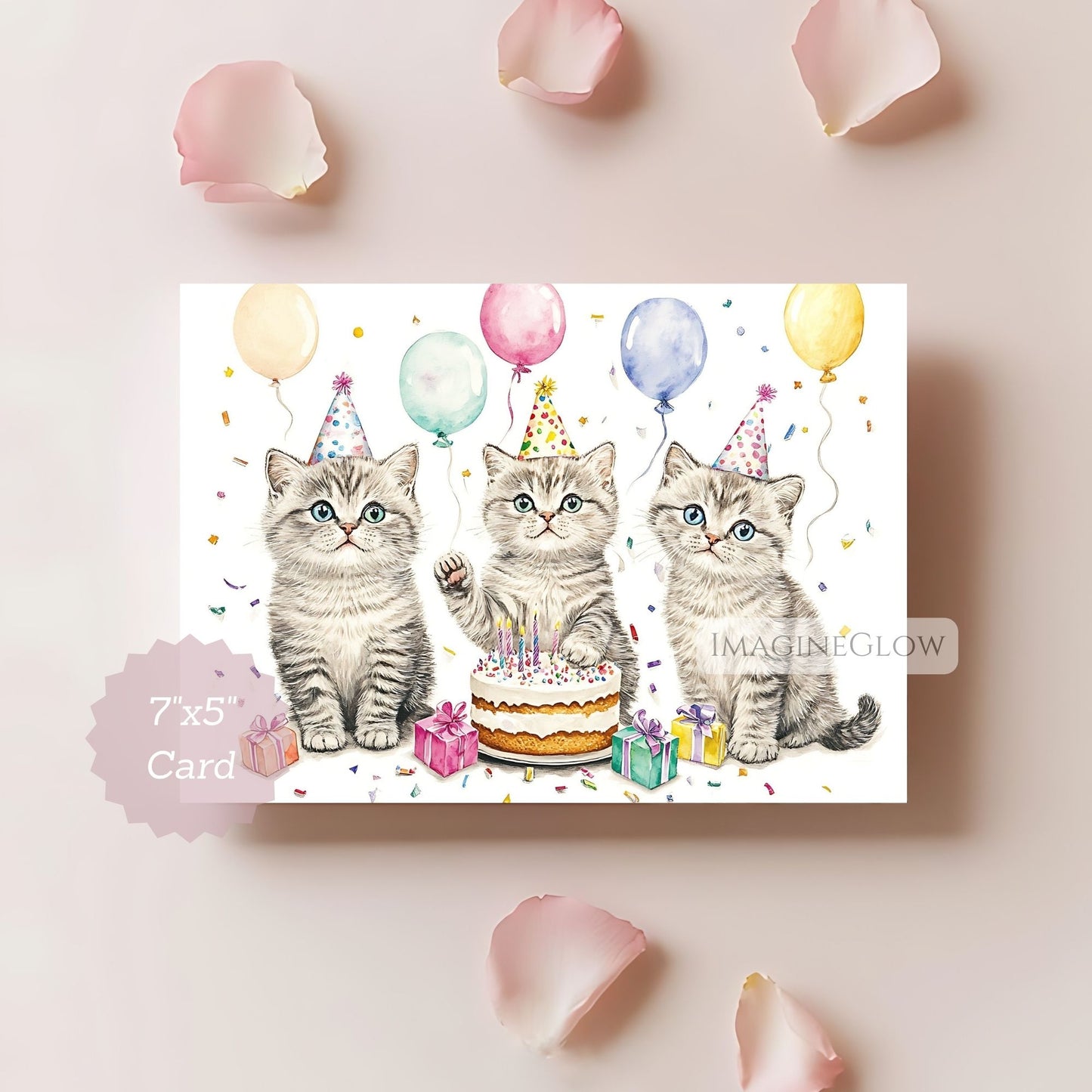 Birthday card with three kittens, balloons, and a cake on a light pink background.