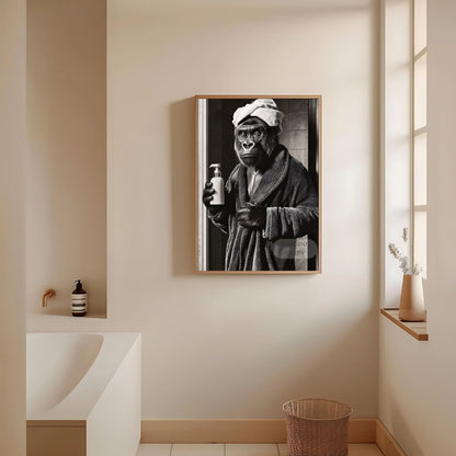 Restroom wall decor featuring a gorilla in black and white
