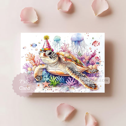Colorful card with a turtle wearing a party hat surrounded by jellyfish, fish, and coral on a pink background.