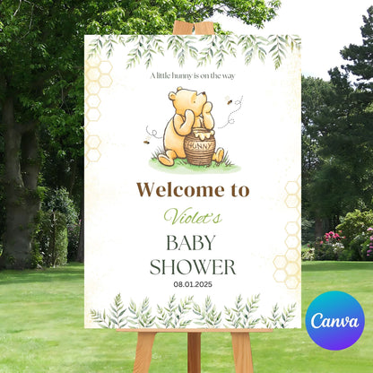 Gender-neutral baby shower welcome sign with Winnie the Pooh design.
