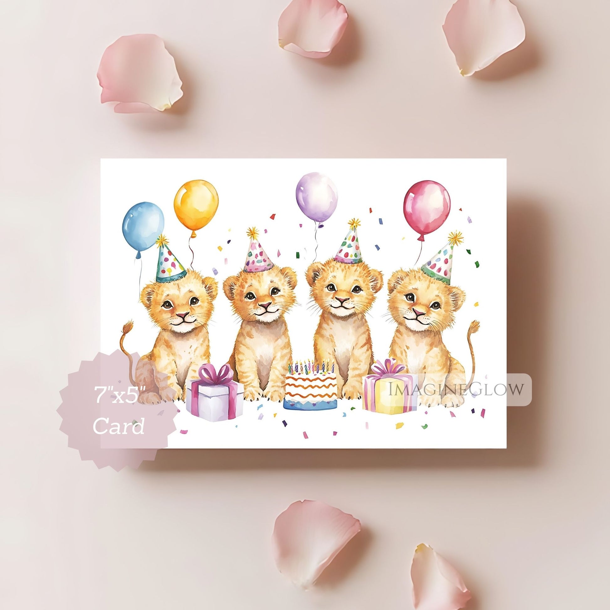 Birthday card with four lion cubs wearing party hats and balloons on a light pink background.