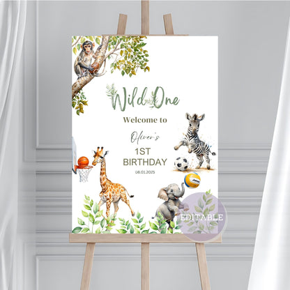 Jungle-themed baby shower decoration with custom safari animals sign.
Printable 1st birthday welcome sign with safari animals and lush greenery.