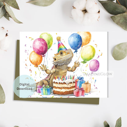 Birthday card with a bearded dragon, balloons, and cake on a white background.