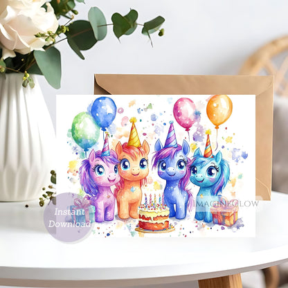 Birthday card with colorful unicorns and balloons on a white surface.