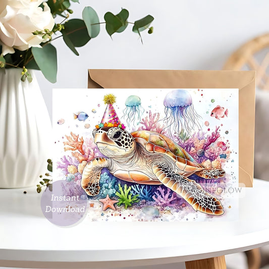 Greeting card with a turtle wearing a party hat surrounded by colorful jellyfish and coral on a white surface.
