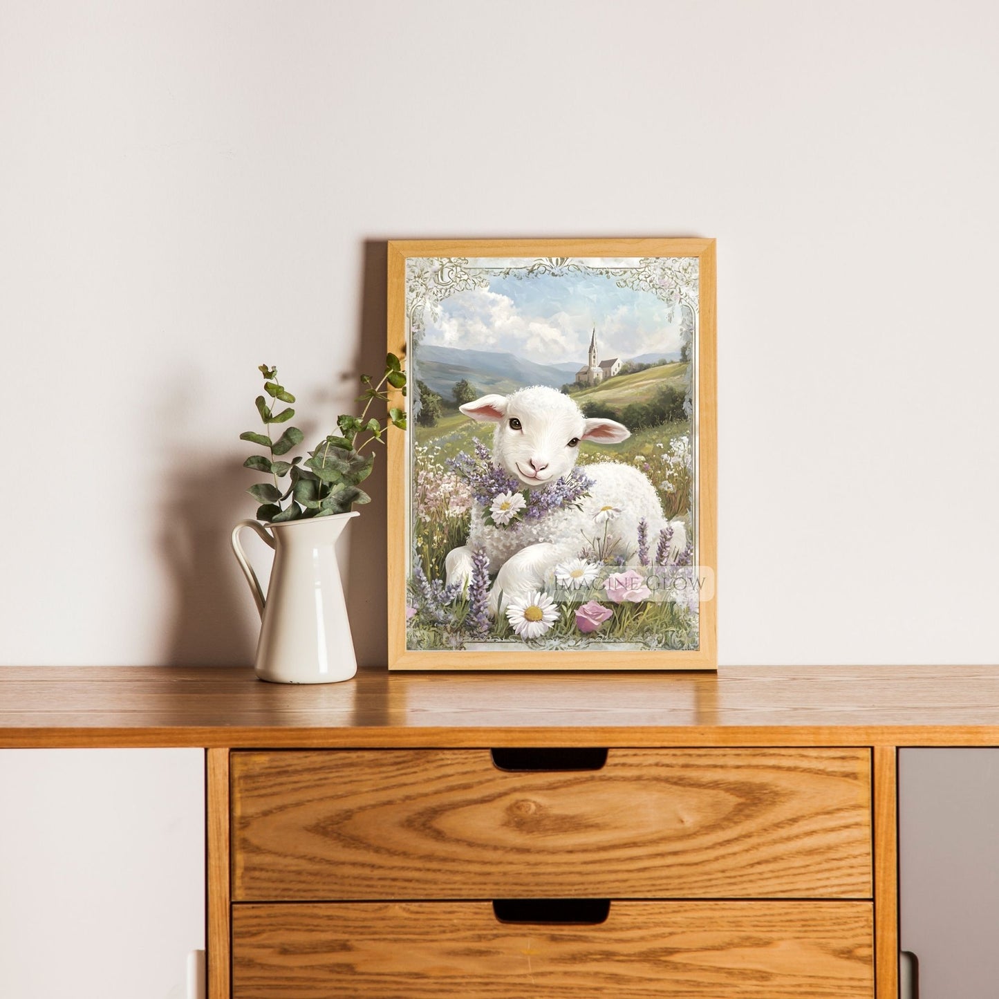 Animal wall art of a lamb in a grassy meadow.
