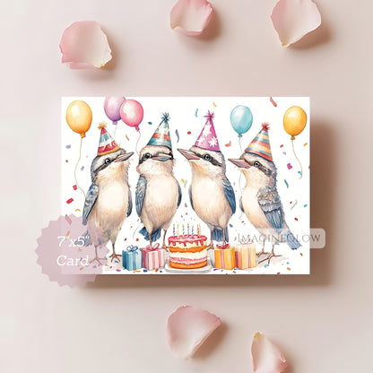 Birthday card with illustrated birds wearing party hats and balloons on a light pink background.