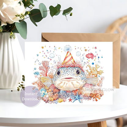 Greeting card with a fish wearing a party hat surrounded by flowers and plants on a white surface.