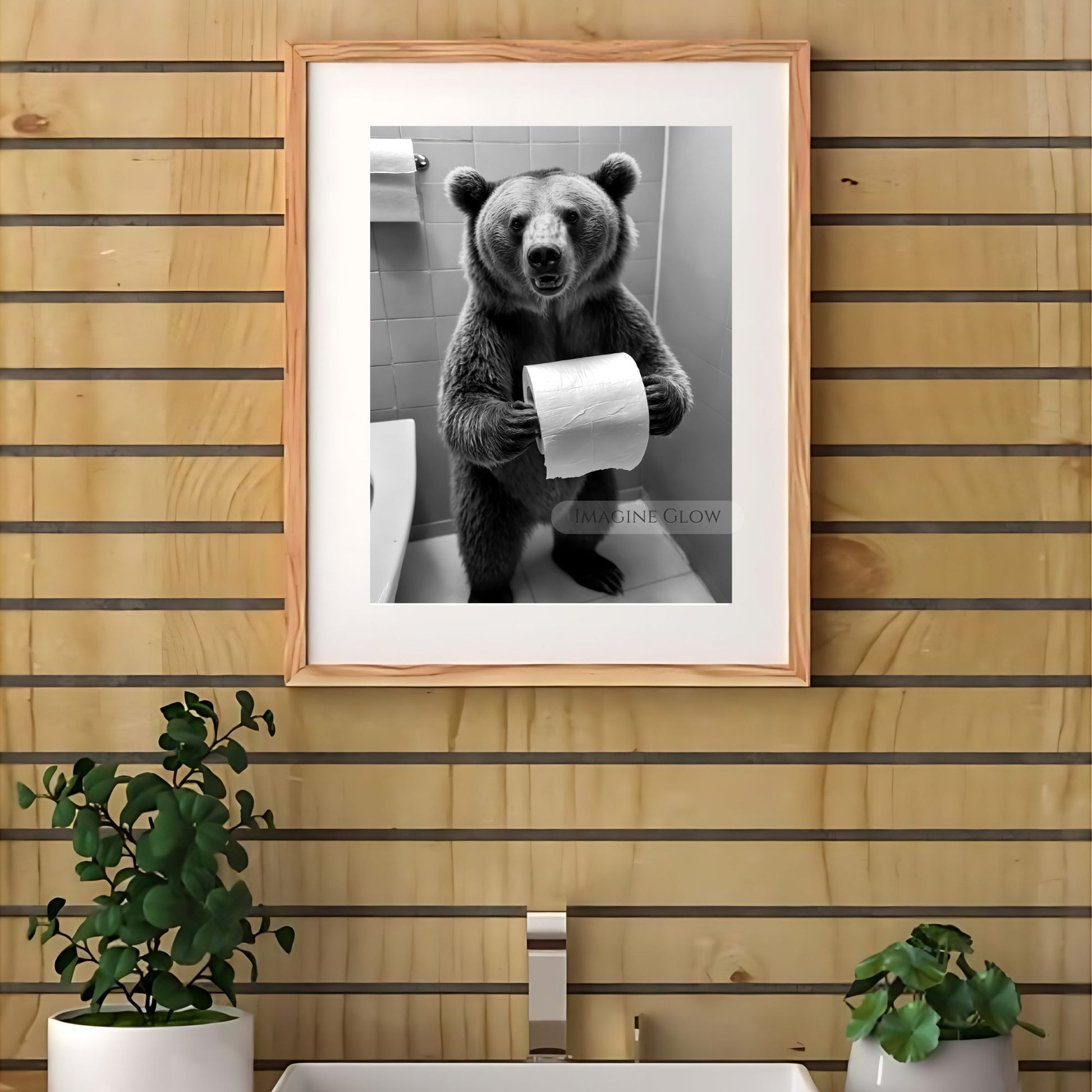 Humorous bear wall art for a fun bathroom vibe.
