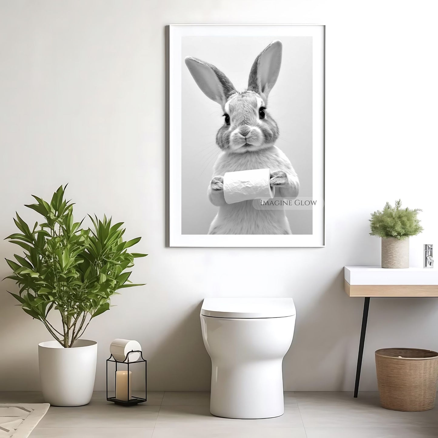 Bunny holding toilet paper artwork for fun bathroom decor.
