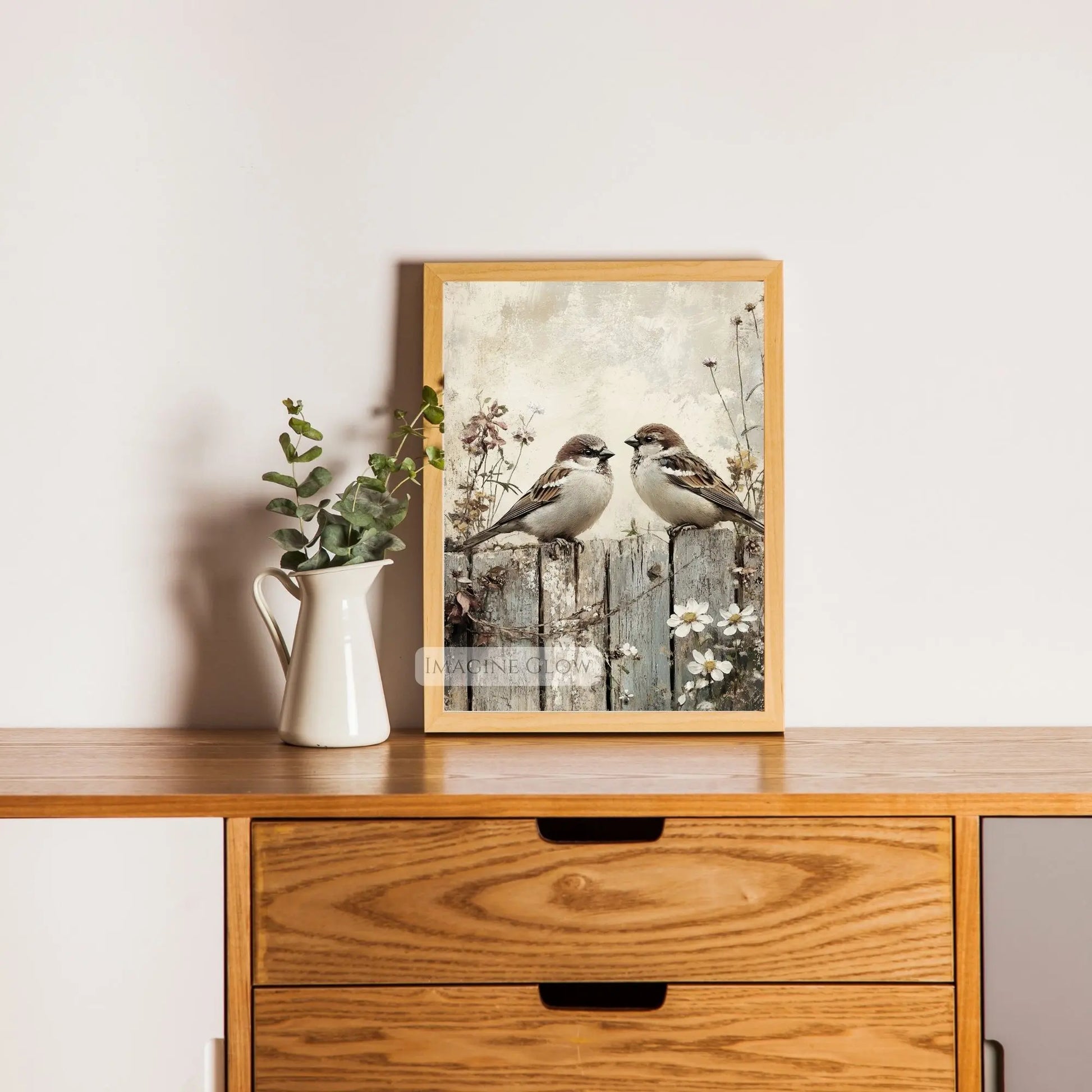 Hand-drawn bird couple illustration with botanical theme.
