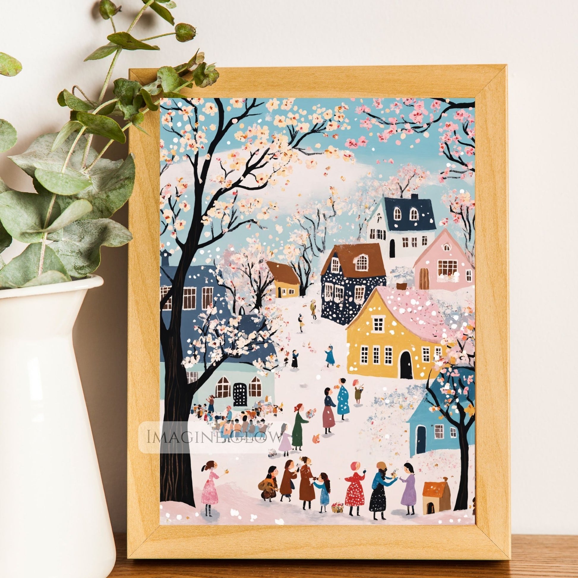 Charming pastel village in spring with blooming trees and lingering snow.
