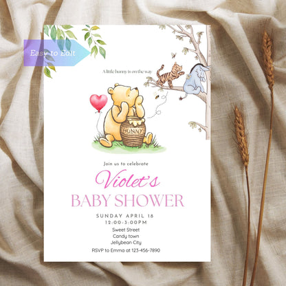 Winnie the Pooh baby shower invitation with "A Little Hunny on the Way."
