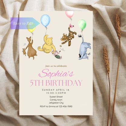 Gender-neutral Winnie the Pooh birthday invite with balloon illustration.
